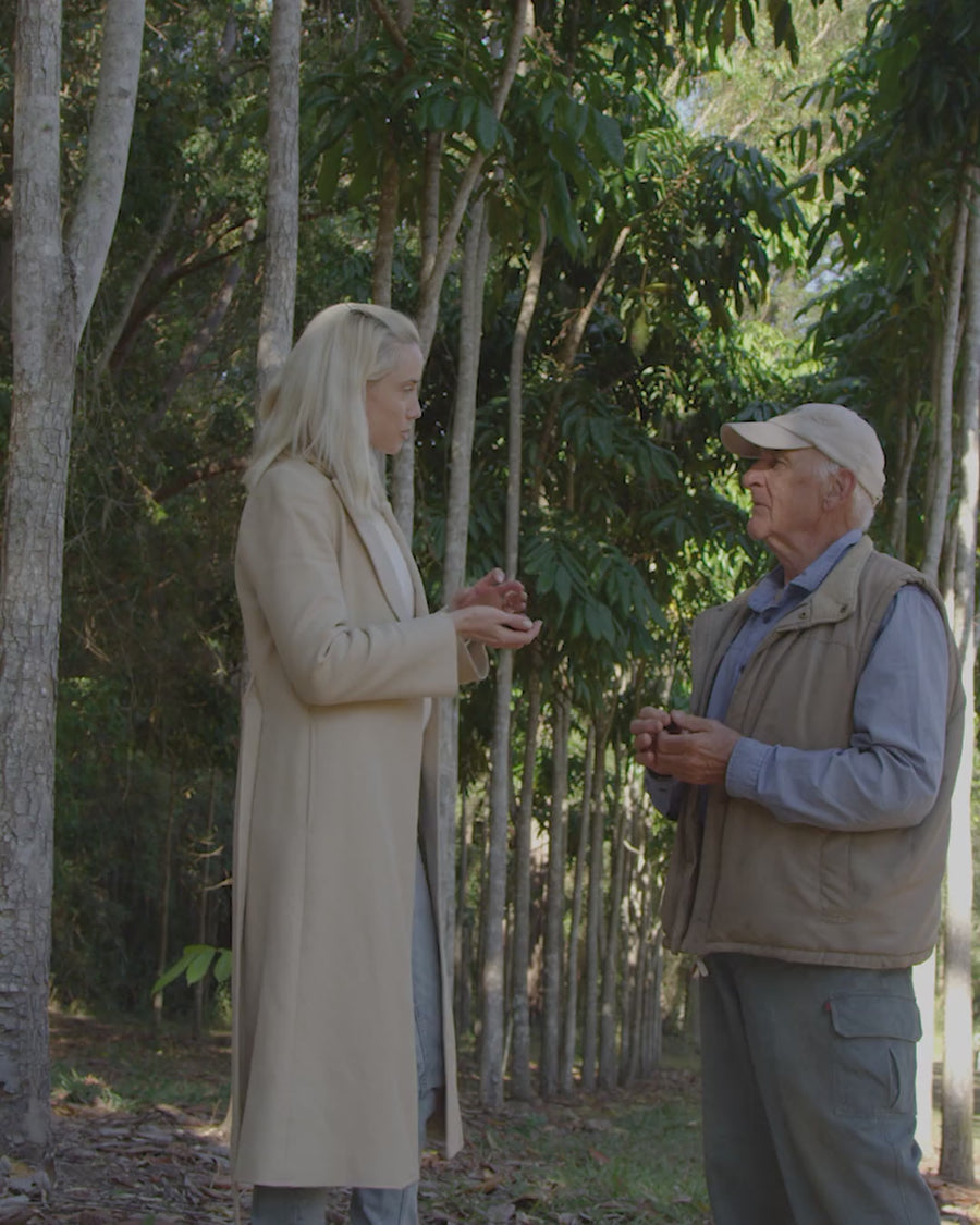 Beth Levis with the Davidson plum grower in the orchard